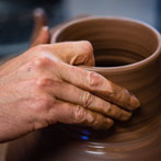 Doug Fitch and Hannah McAndrew making a jug for me